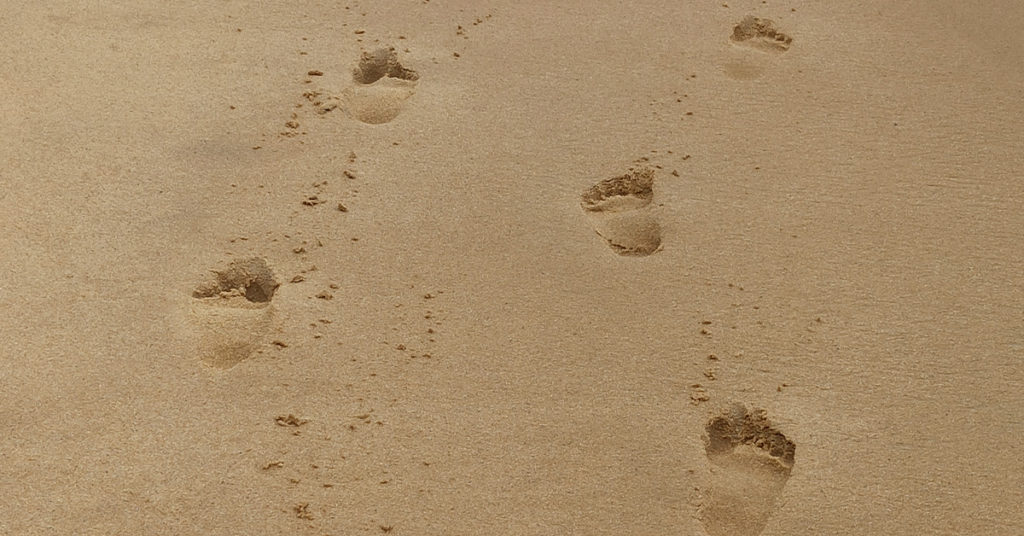 footprints in the  sand