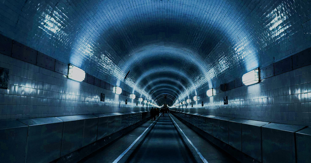 blue lit tunnel